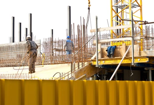 Bricklayer in a construction site