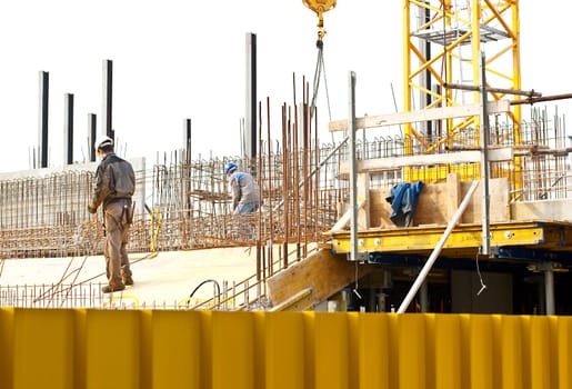 Bricklayer in a construction site