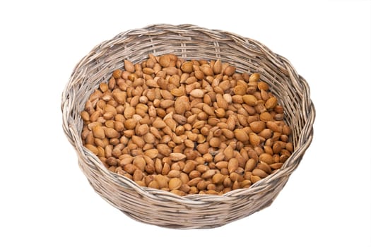 Photo of almonds inside a wicker basket