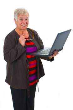 Senior woman using laptop - isolated on white background