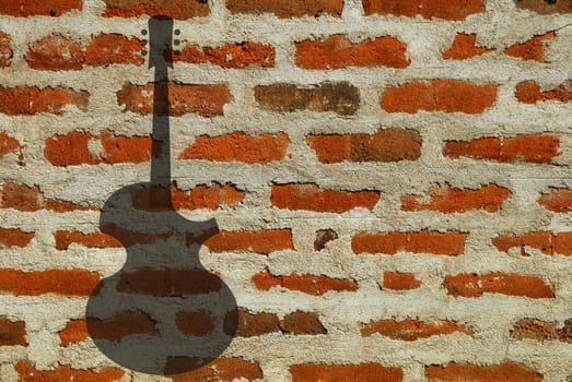 guitar hanging on a wall