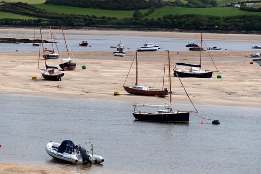 Boats at low tide at Wadebridge in Cornwall