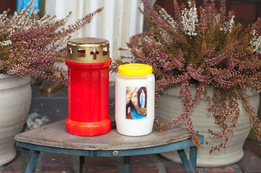 two religious candles in a small chapel