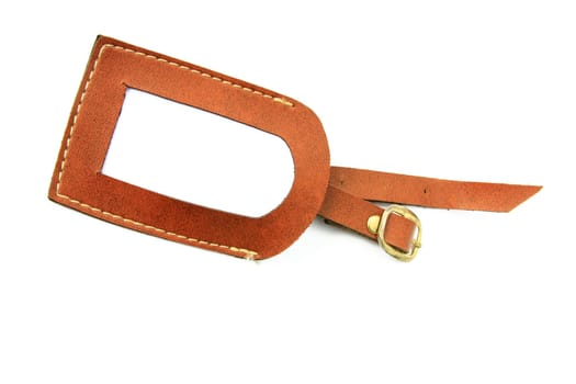 Luggage tag with blank writing field against white background