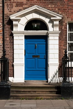 gorgeous blue georgian door with staircase in Dublin, Ireland