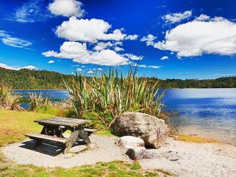 Table for picnic on lakeside in New Zealand.
