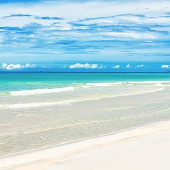 Tropical sandy beach at summer sunny day