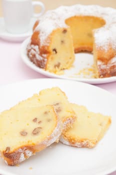 Gugelhupf - Slices of Traditional Gugelhupf Sponge Cake with Raisins and Walnuts