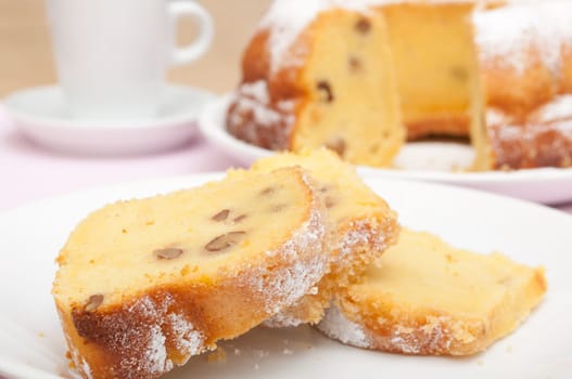 Gugelhupf - Slices of Traditional Gugelhupf Sponge Cake with Raisins and Walnuts