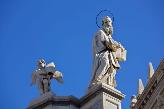 Statue of an ancient religious figure on the Catania cathedral