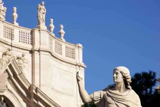 Statue of an ancient religious figure next to the cathedral of Catania