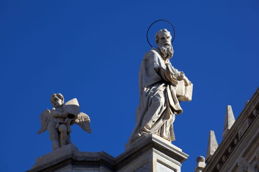 Statue of an ancient religious figure on the Catania cathedral
