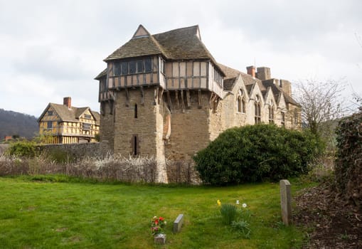 Gatehouse entrance to Stokesay castle on a dark cloudy day