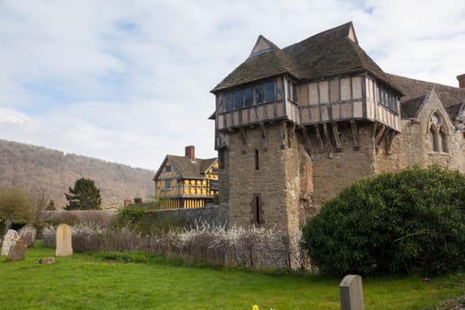 Stokesay castle on a cloudy day from cemetery
