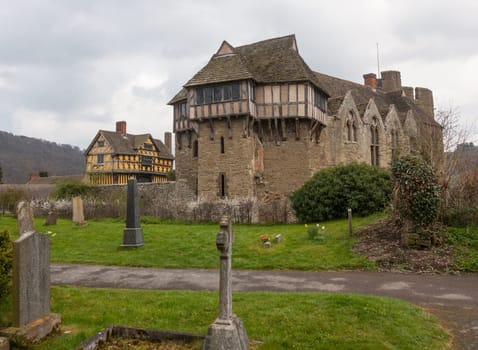 Gatehouse entrance to Stokesay castle on a dark cloudy day