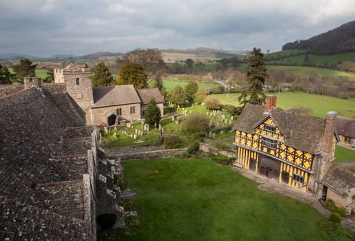 Gatehouse entrance to Stokesay castle on a dark cloudy day