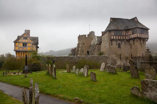 Stokesay Castle in England on damp raining day from cemetery
