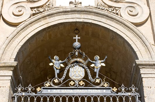 Iron sculpture on Enna cathedral gate