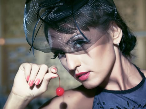 Fashion woman retro portrait with a cocktail
