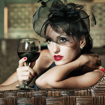 Fashion woman retro portrait in a restaurant
