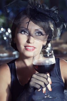 Fashion woman retro portrait in a restaurant