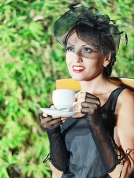 Fashion woman retro portrait in a restaurant