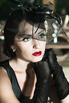 Fashion woman retro portrait in a restaurant