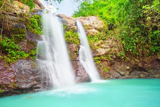 Beautiful waterfall at summer sunny day. Bali