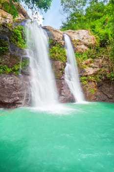 Beautiful waterfall at summer sunny day. Bali
