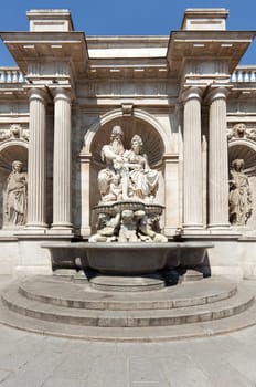 Statue in front of the Albertina,Vienna,with fountain in the inner city