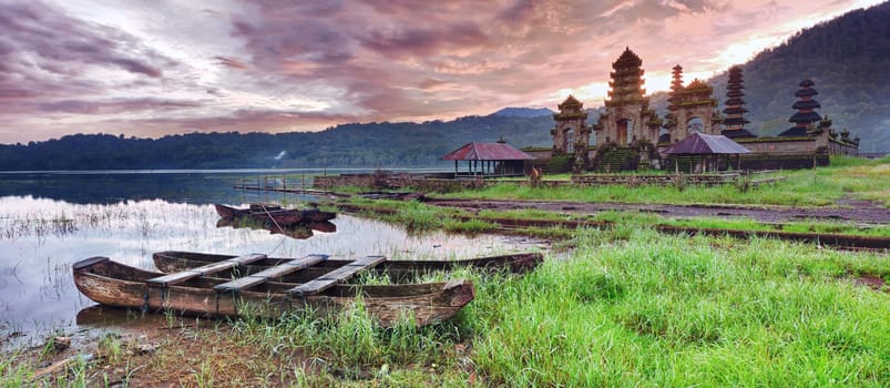 Temple Komala Tirta at sunrise time. Tamblingan lake. Bali