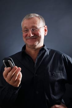 Man with phone smiling