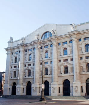 Palazzo della borsa. Exchange building on dramatic sky, Milan - Italy