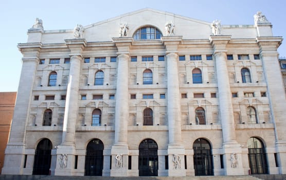 Palazzo della borsa. Exchange building on dramatic sky, Milan - Italy