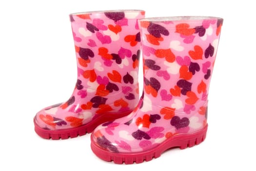 Colorful children&#039 s rain boots on white background