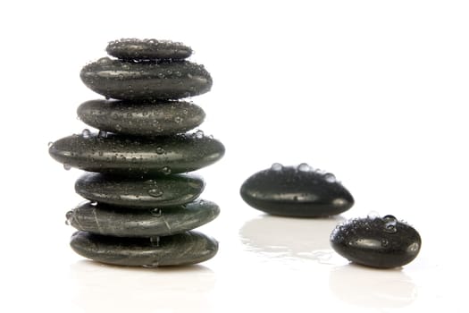 wet zen stones isolated over a white background.