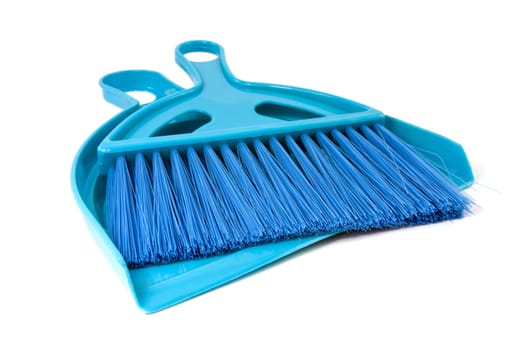blue scoop for dust and brush on white background