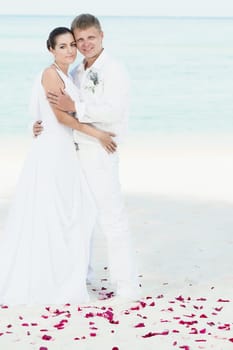 Bbride and groom on the tropical beach