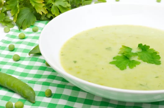 Green Creamy Pea Soup in White Plate