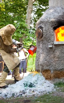 Workers during the Glass processing - Hot melting glasses