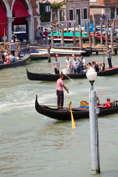 Gondoliere in the lagoon of Venice