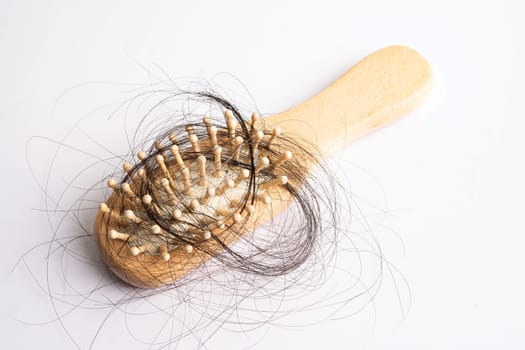 Hair loss fall with comb bush serious problem health, beauty and cosmetic concept.