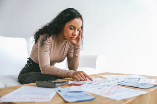 Stressed young woman has financial problems with credit card debt to pay crucial show concept of bad personal money and mortgage pay management crisis. sad and unhappy