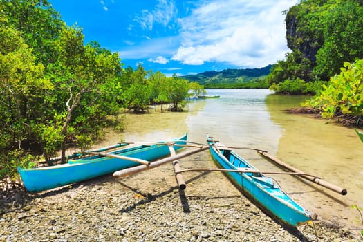 Traditional Philippine boat in the tropical lagoon