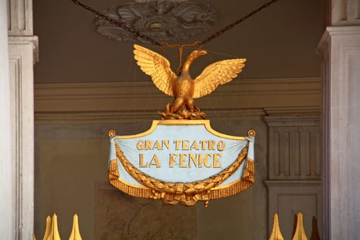 Sign "Gran Teatro La Fenice"" at the entrance of the famous opera house in Venice,Italy"