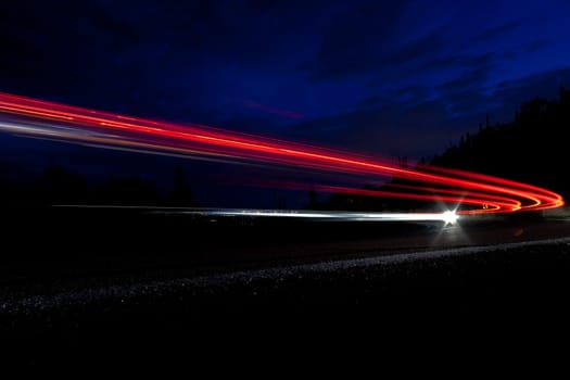 car light on interstate in mountain desert  landscape in Arizona
