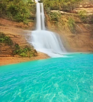 Beautiful waterfall at summer sunny day. Philippines