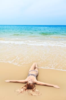 Beautiful woman in bikini on the beach