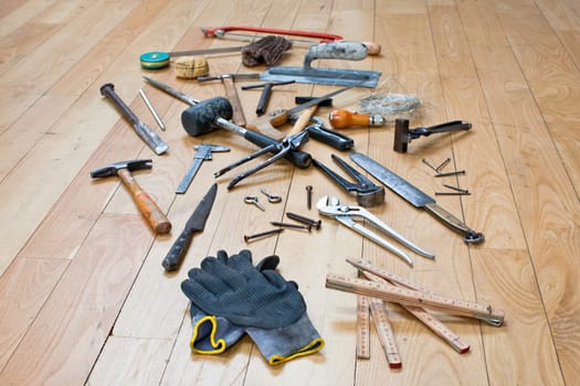 A lot of tools on wooden floor