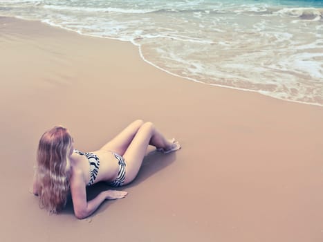 Beautiful woman in bikini on the beach